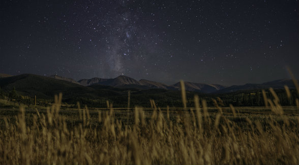 HEAVENLY SETTING | Only the Rocky Mountains stand between guests and the nighttime sky.